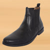 Stylish leather boot highlighting its rich texture and sleek silhouette