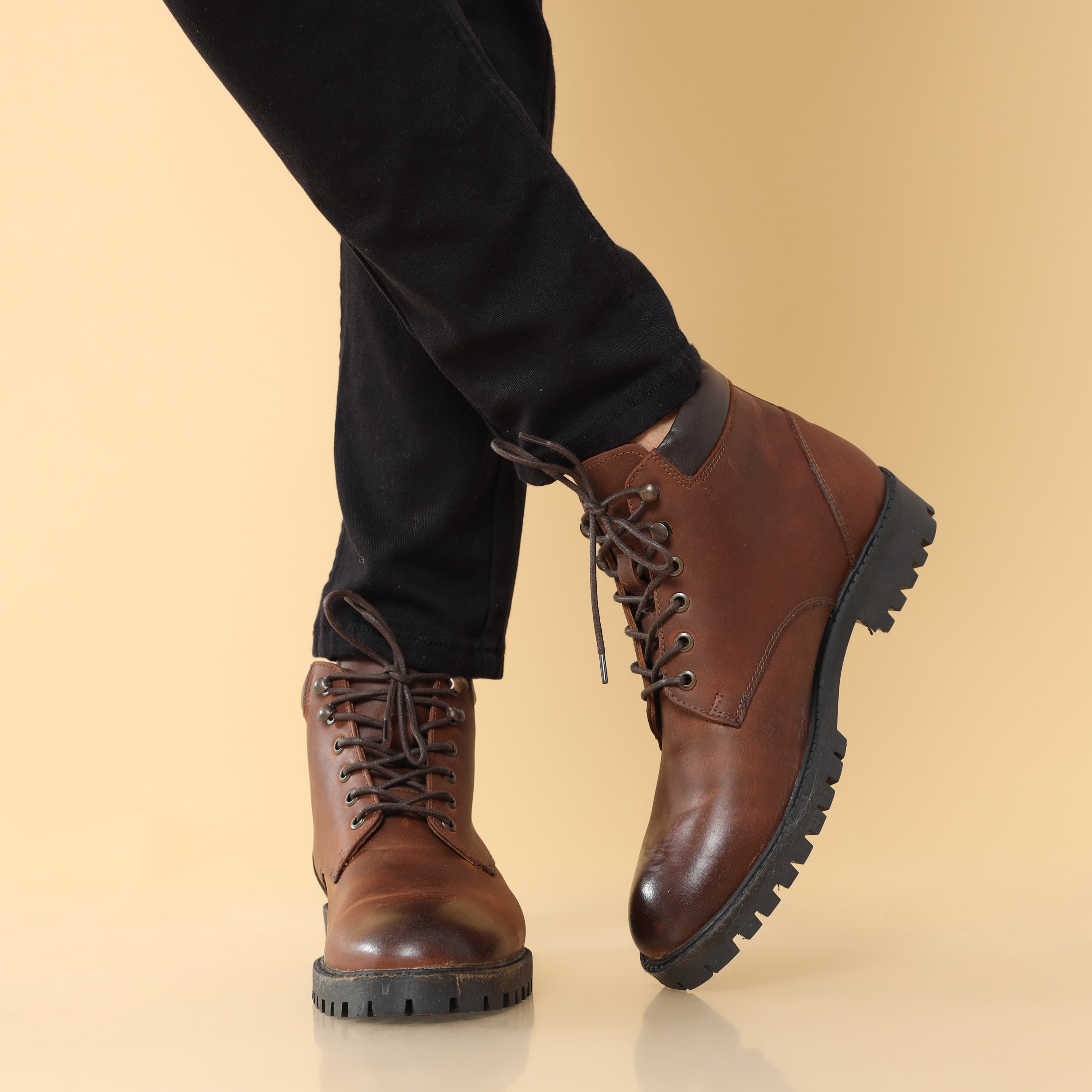 "Durable black leather boot accented with a smooth-operating zipper, ideal for everyday wear and versatility.