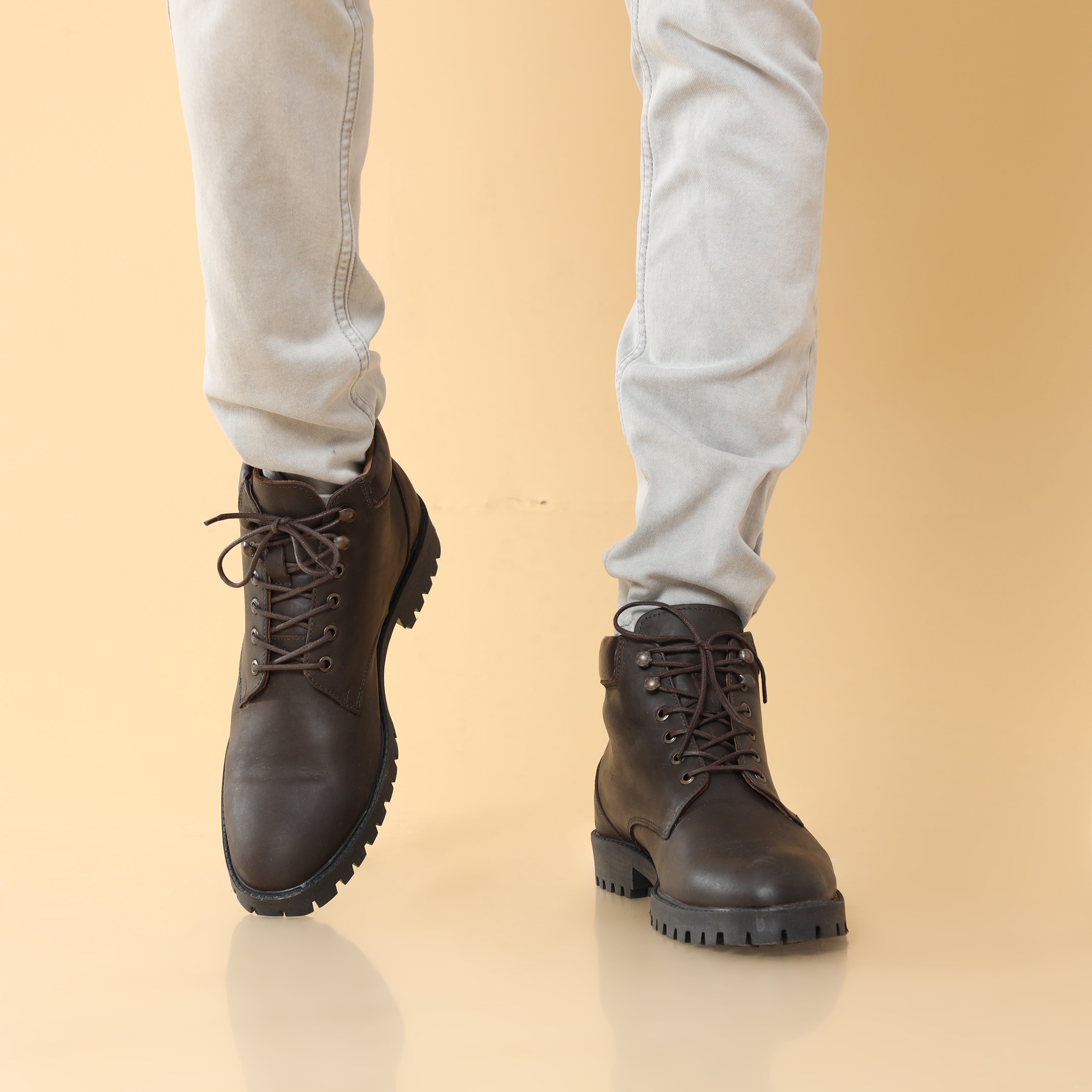 Classic men's leather boot with intricate stitching and robust construction